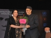 Shama being facilitated by Dr. Karan Singh, Chairman, ICCR, India at a function at IHC, New Delhi on the occasion of the ...